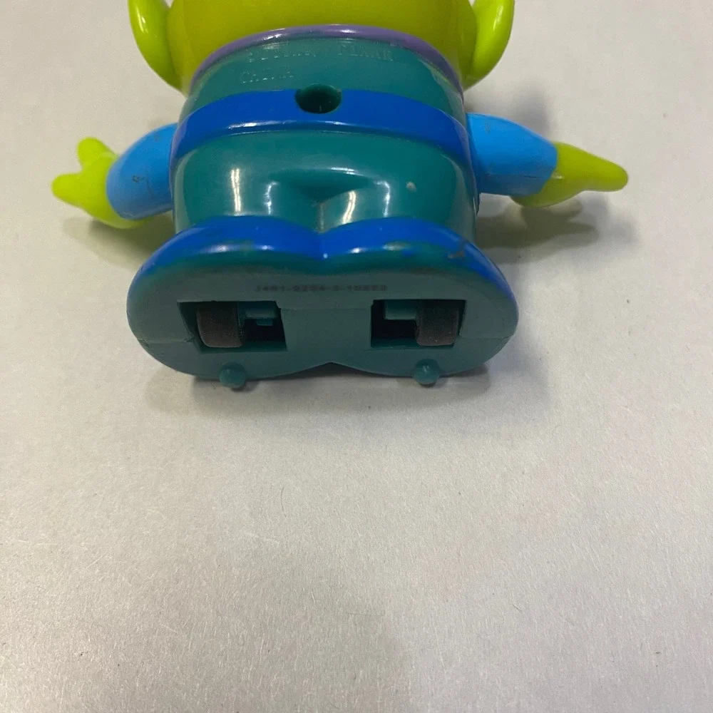 Vintage Disney Pixar Toy Story Three Eyed Green Alien Plastic Wheels